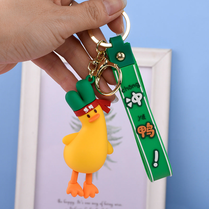 Wholesale PVC Tilted Head Little Yellow Duck Doll Keychain